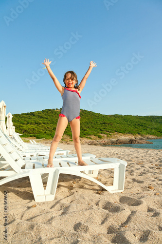 happiness young girl on vacation photo