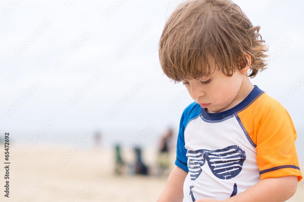 Boy playing on the beach Boy playing on the beach