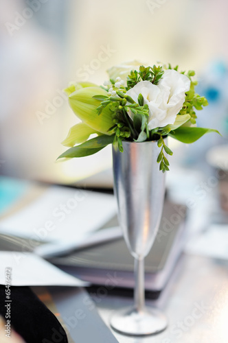 White flowers in silvery vase