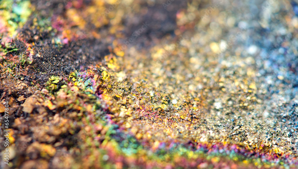 Fantastic background, magic of a stone, rainbow in metal rock Fantastic background, magic of a stone, rainbow in metal rock