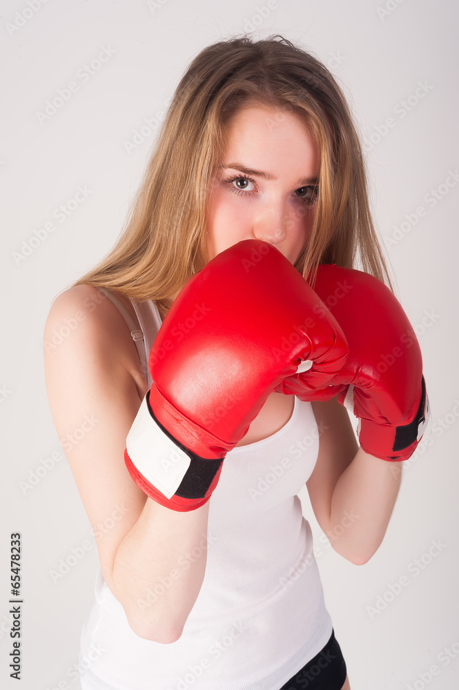 Pretty girl with boxing gloves