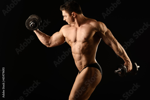 lifting weights © Andrey Kiselev
