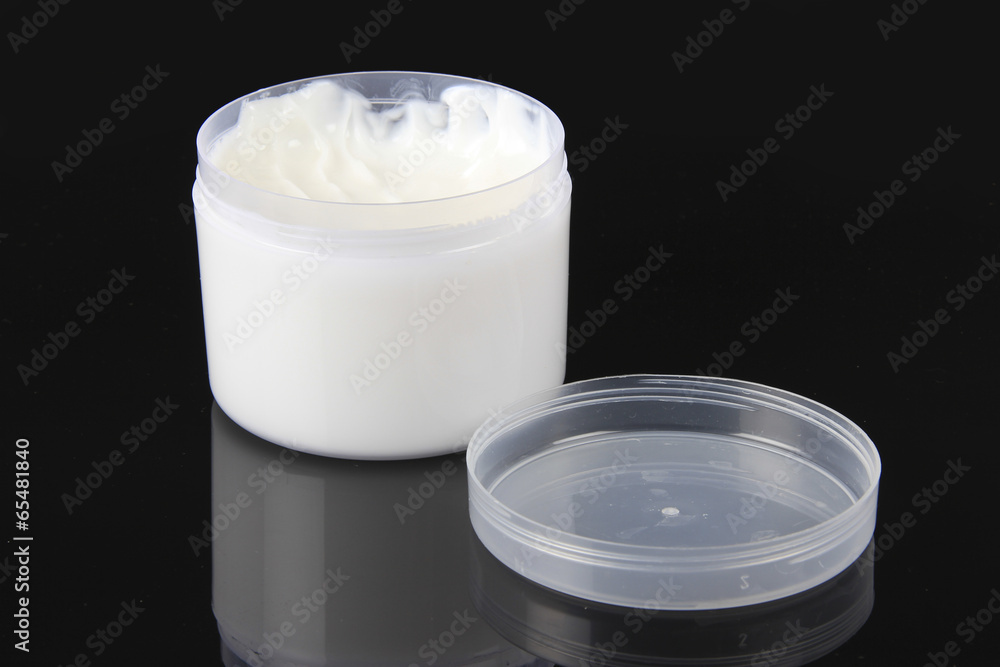 Cream on black background