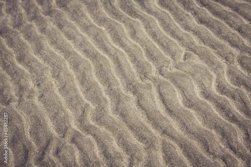Obraz na płótnie close up of sea beach sand or Desert sand for texture and backgr w salonie