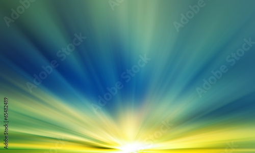 Summer background with a magnificent sun burst with lens flare.