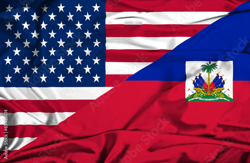 Fényképezés Waving flag of Haiti and USA