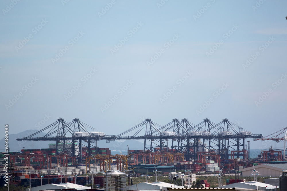 Crane for lifting cargo in container port.