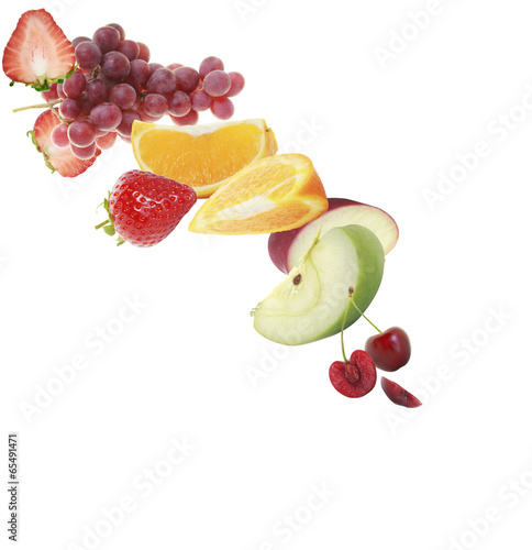 various type of fruit slices stacked with splash