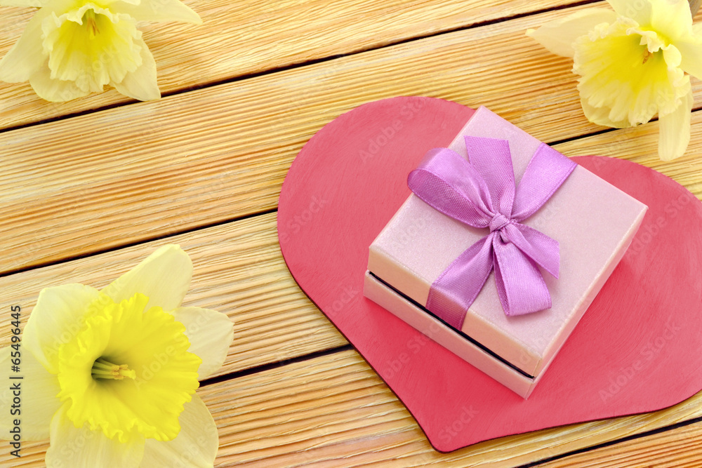 Gift with heart and flowers