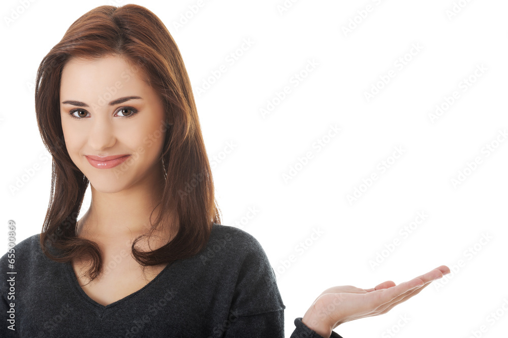Woman showing something or copyspase Woman showing something or copyspase