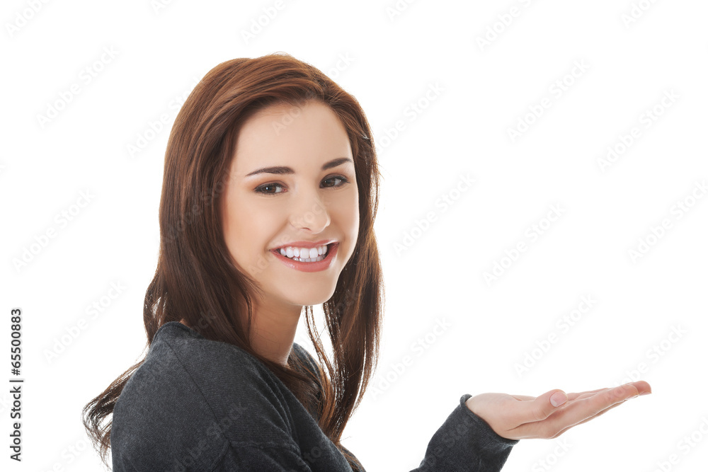 Woman showing something or copyspase Woman showing something or copyspase