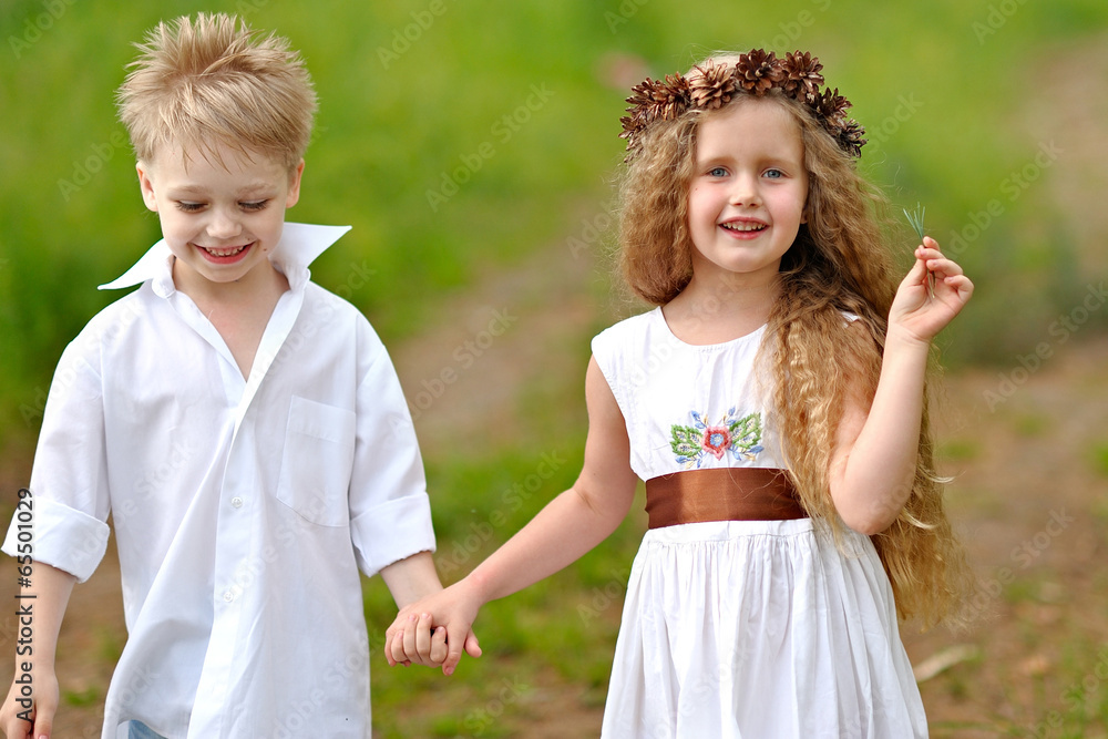 Portrait of a boy girl in a summer forest Portrait of a boy girl in a summer forest