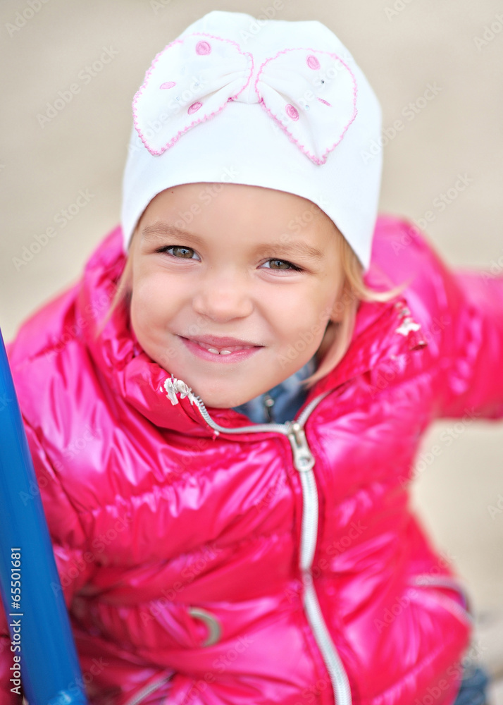 portrait of a little girl at the playground portrait of a little girl at the playground