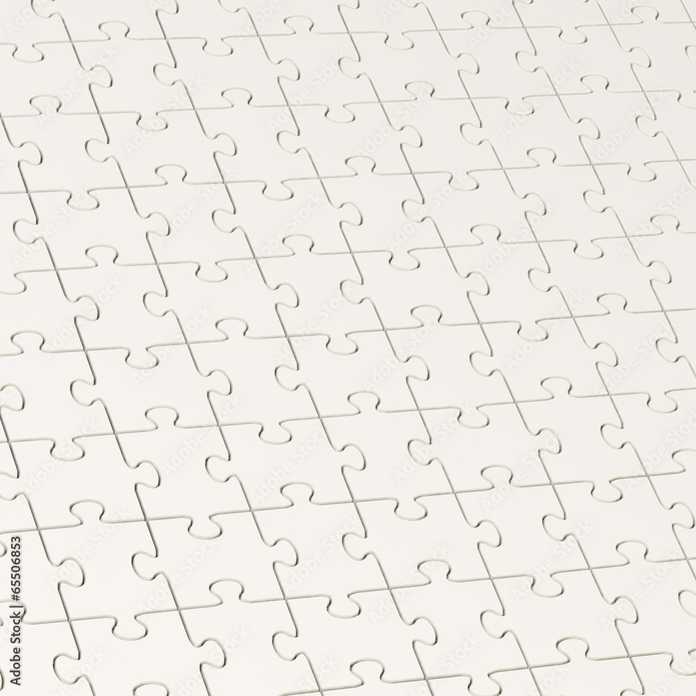 Surface covered with puzzle pieces Surface covered with puzzle pieces