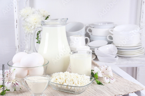 Still life with tasty dairy products on table