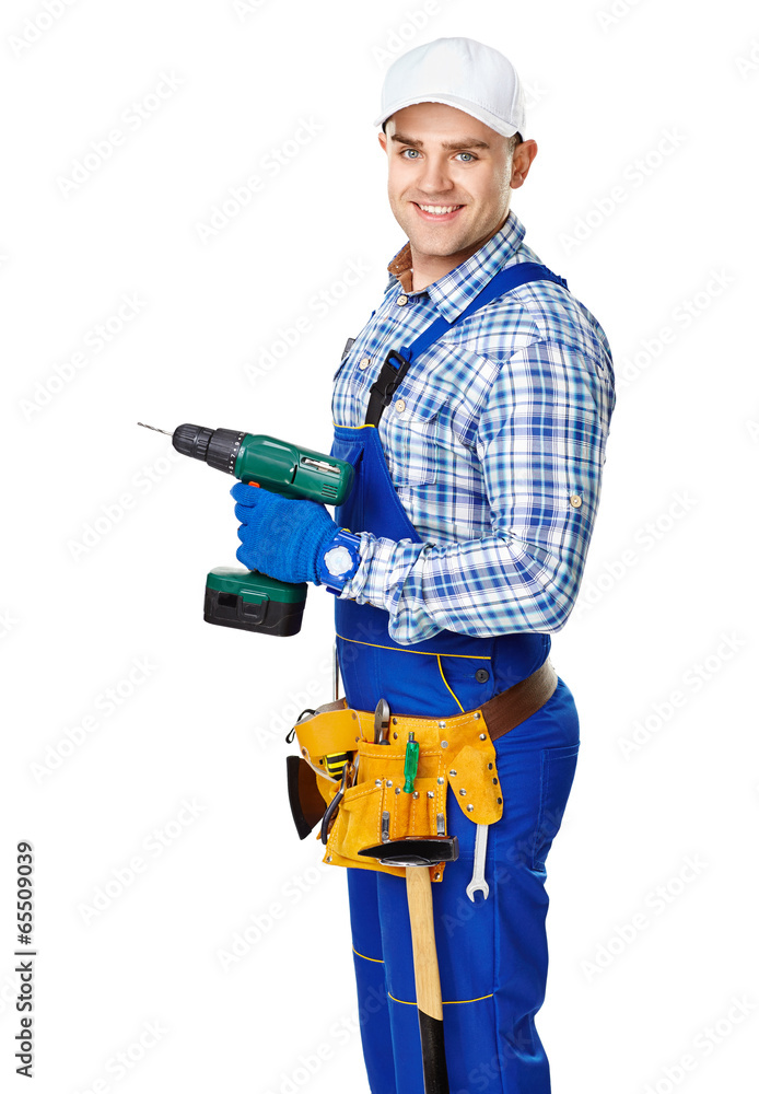 Young construction worker with electric drill Young construction worker with electric drill