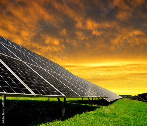 Solar energy panels in the setting sun