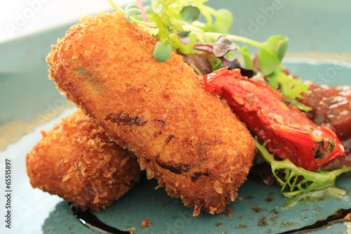 Obraz na plátne croquette potatoes with salad