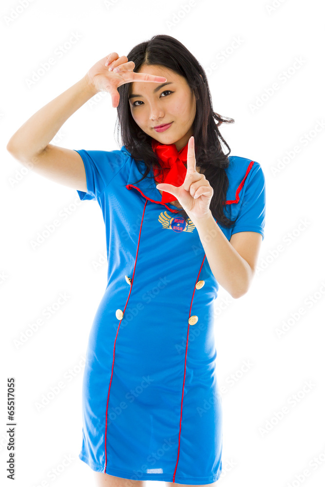 Asian air stewardess looking through finger frame Asian air stewardess looking through finger frame