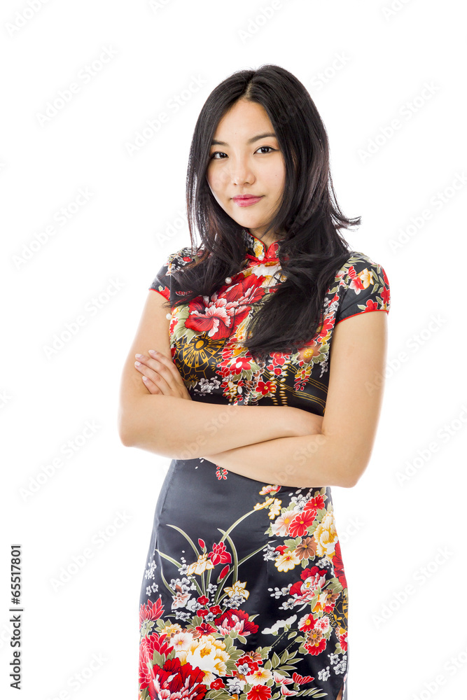 Confident Asian young woman standing with arms crossed Confident Asian young woman standing with arms crossed