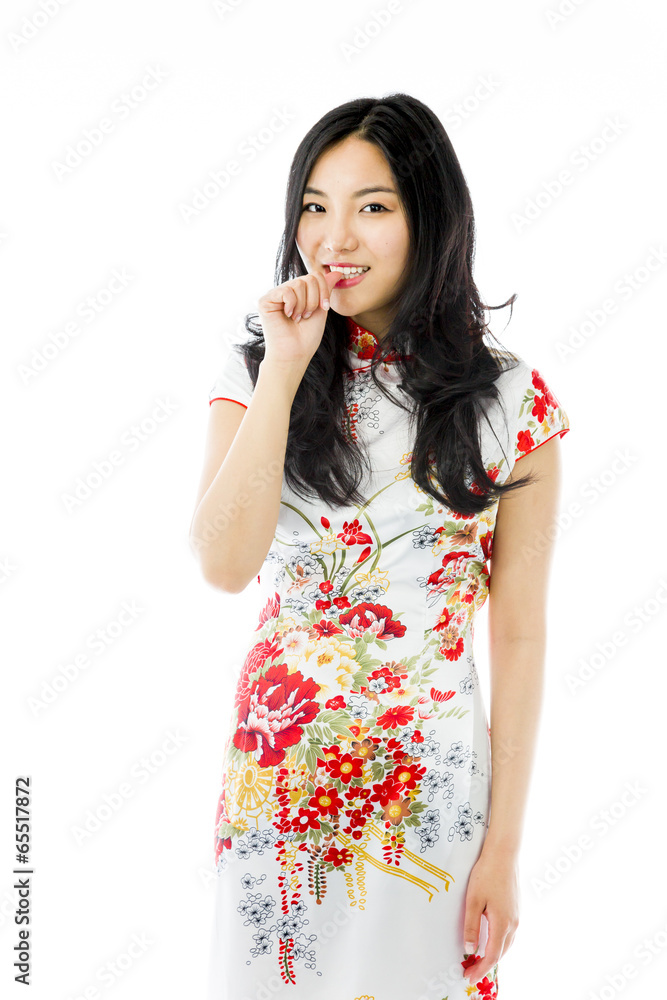 Asian young woman with finger in mouth Asian young woman with finger in mouth