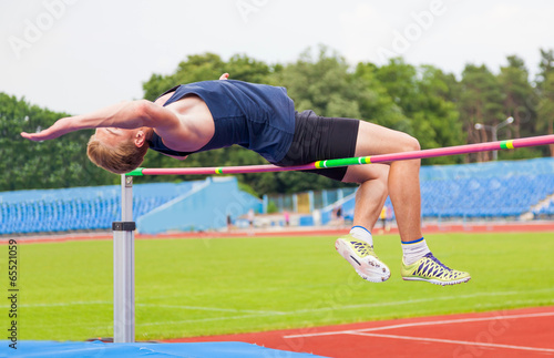 athlete jumps in height