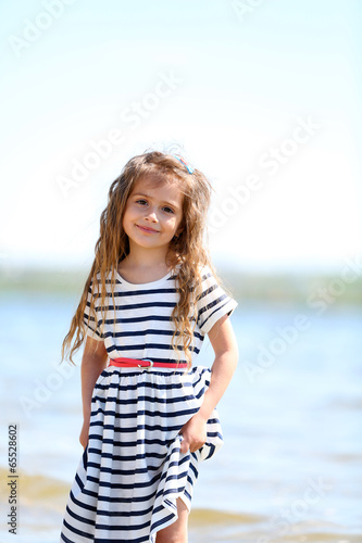 Beautiful little girl on th...