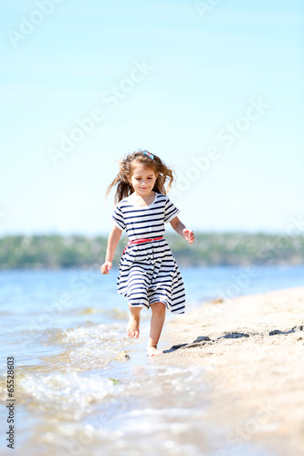 Beautiful little girl on th...