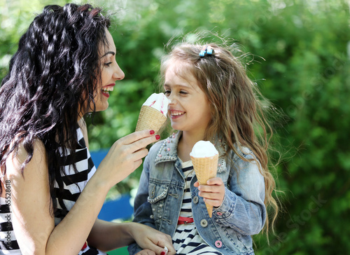 Happy mom and daughter. Wal...