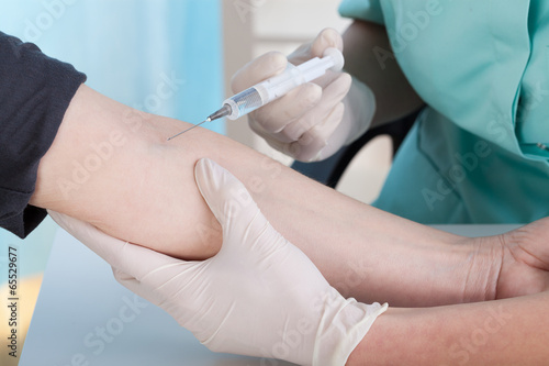 Nurse doing injection