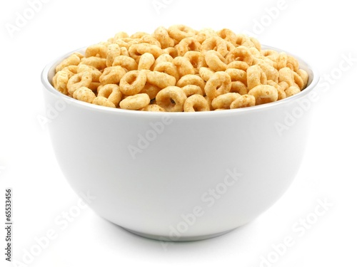 Bowl of oat cereal on a white background