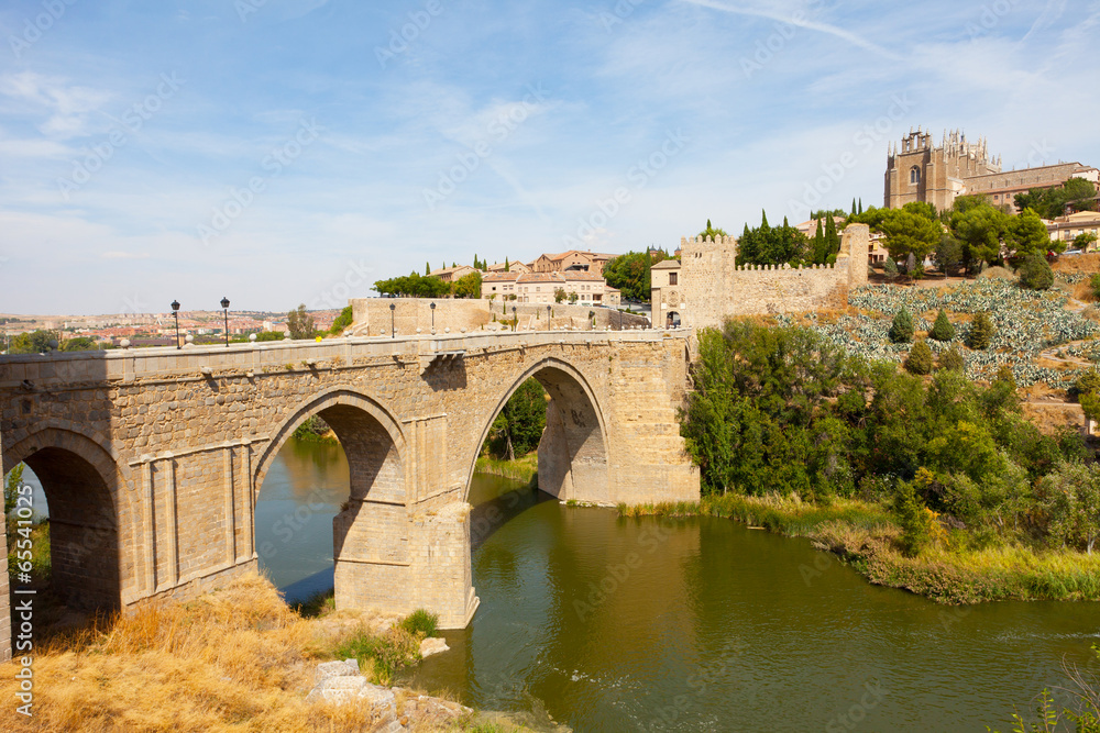 Old stone Alkantar Bridge in Toledo, Spain