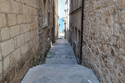 Fototapeta Naklejka Na Ścianę i Meble -  Narrow street in old medieval town. Korcula, Croatia, Europe