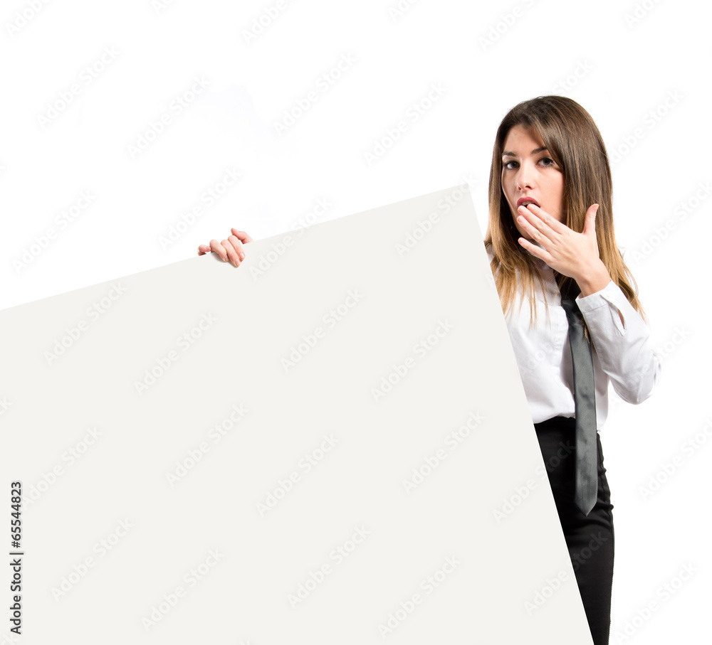 Businesswoman holding placard over white background Businesswoman holding placard over white background