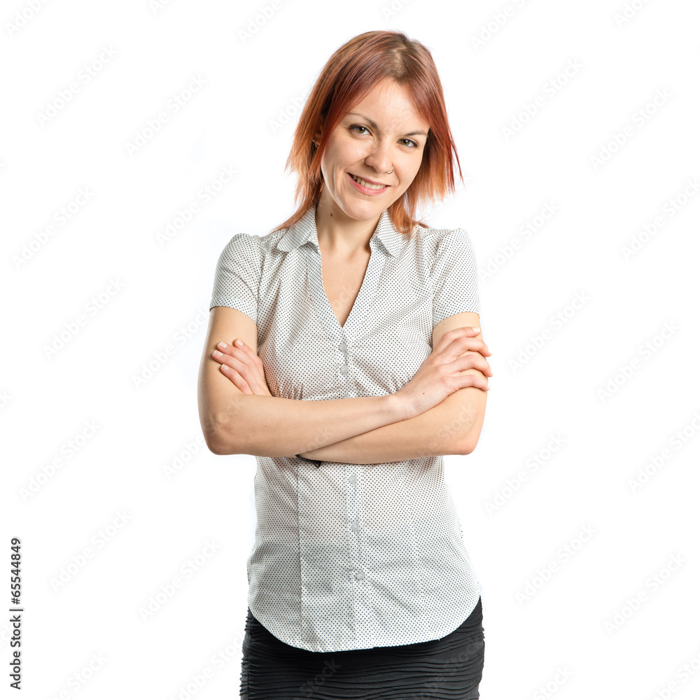 Young woman with hers arms crossed over white background Young woman with hers arms crossed over white background
