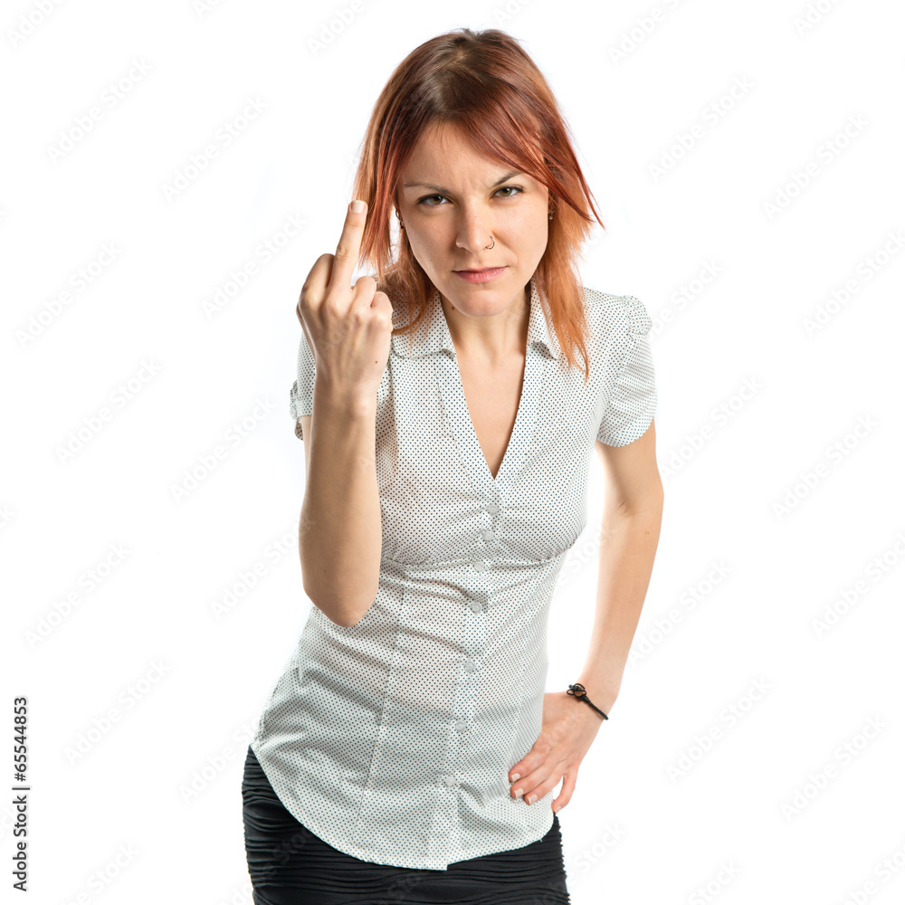 young girl making horn gesture over white background