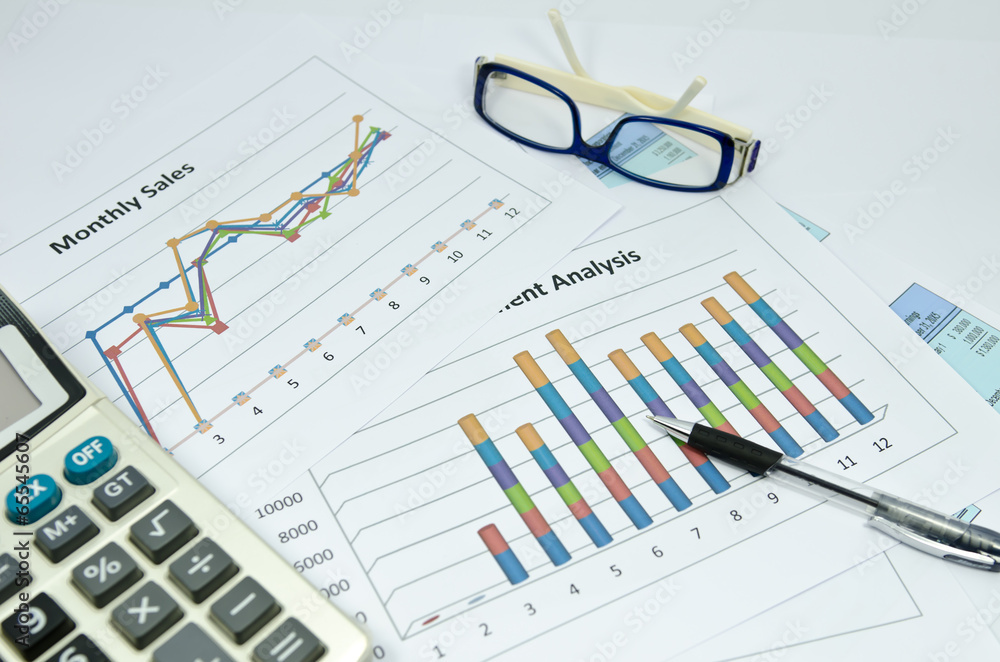 business charts and graph with glasses eye and pen business charts and graph with glasses eye and pen