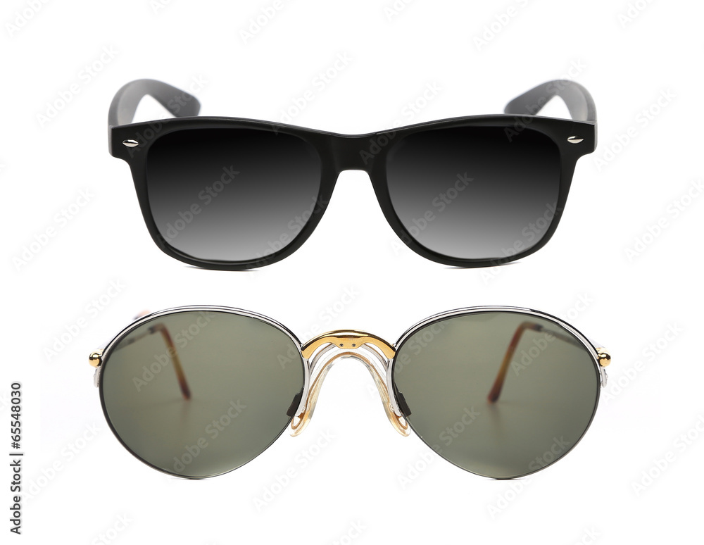 Two pair of fashionable sunglasses. Two pair of fashionable sunglasses.