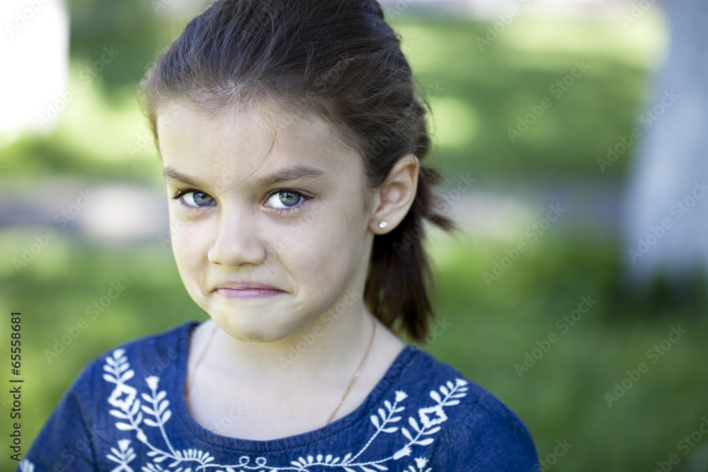Portrait of aggressive little girl
