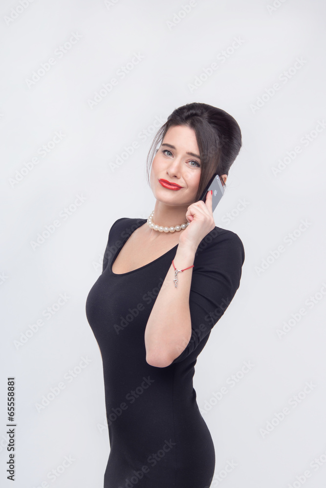 Pretty business lady standing with book