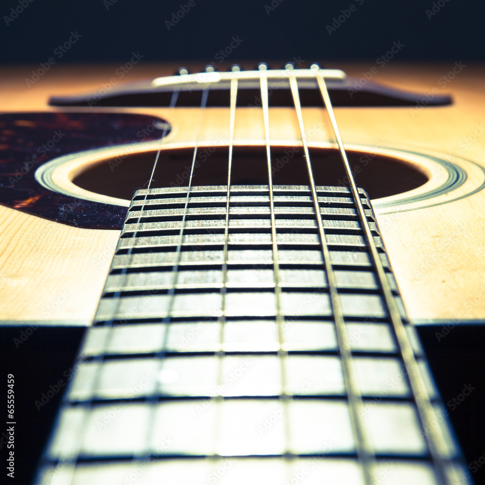 acoustic guitar detail on black background acoustic guitar detail on black background
