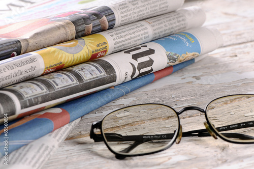 Glasses with the newspaper photo