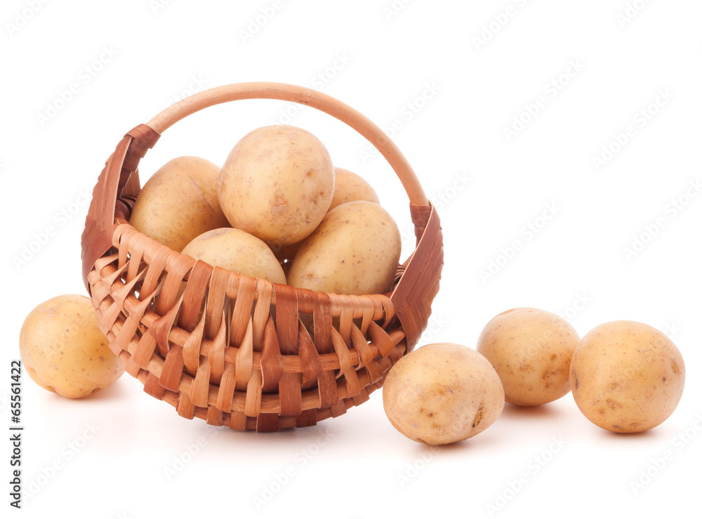 Potato tuber in wicker basket isolated on white background Potato tuber in wicker basket isolated on white background
