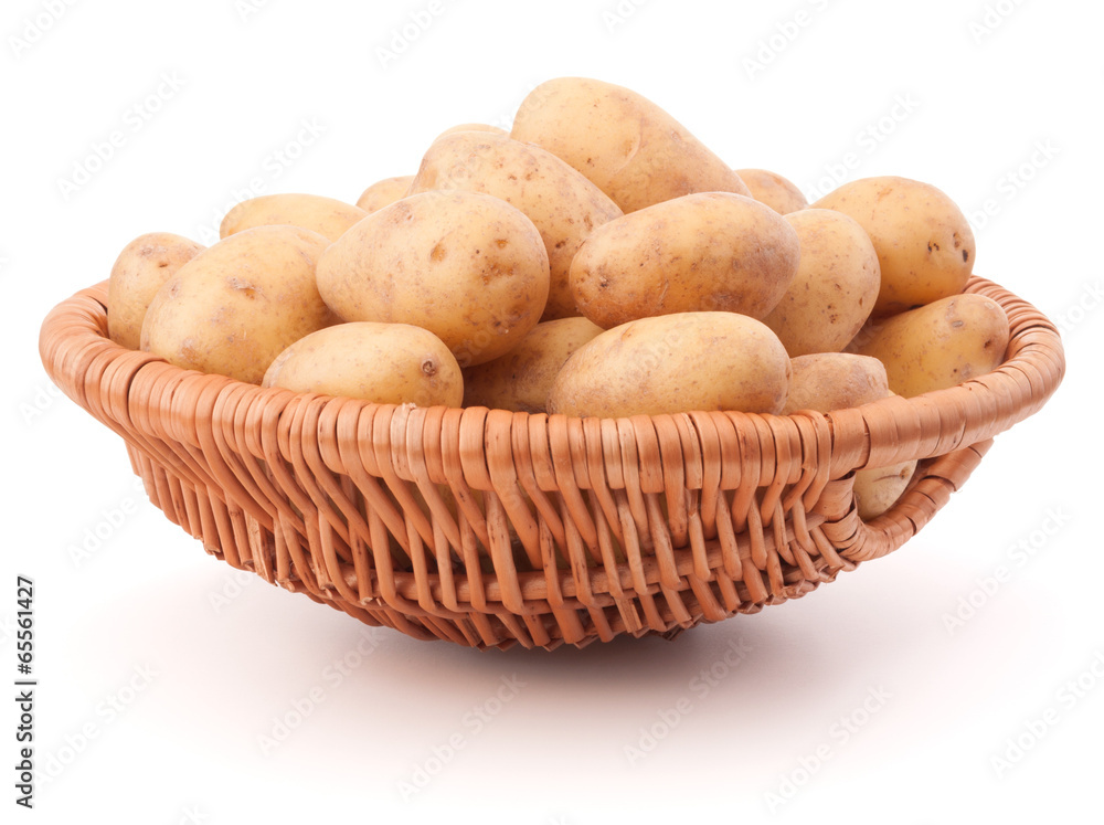 Potato tuber in wicker basket isolated on white background Potato tuber in wicker basket isolated on white background