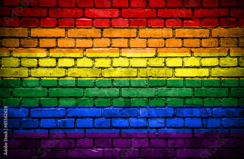 Brick wall with painted flag of Pride