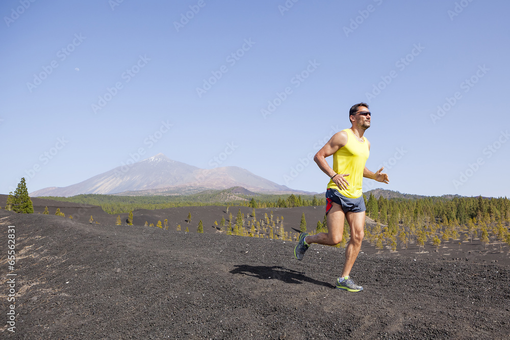 Man running outdoors, cross country trail run