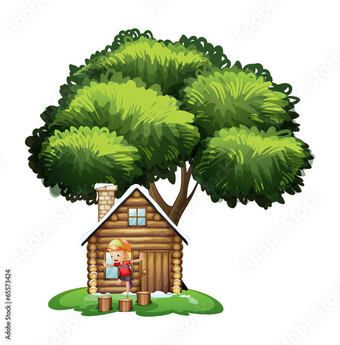 A house under the tree with a little boy playing
