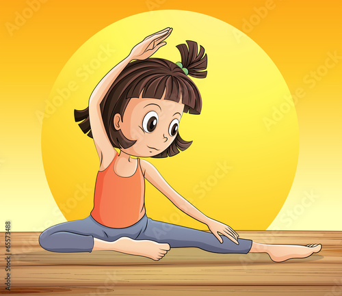 A young lady doing yoga