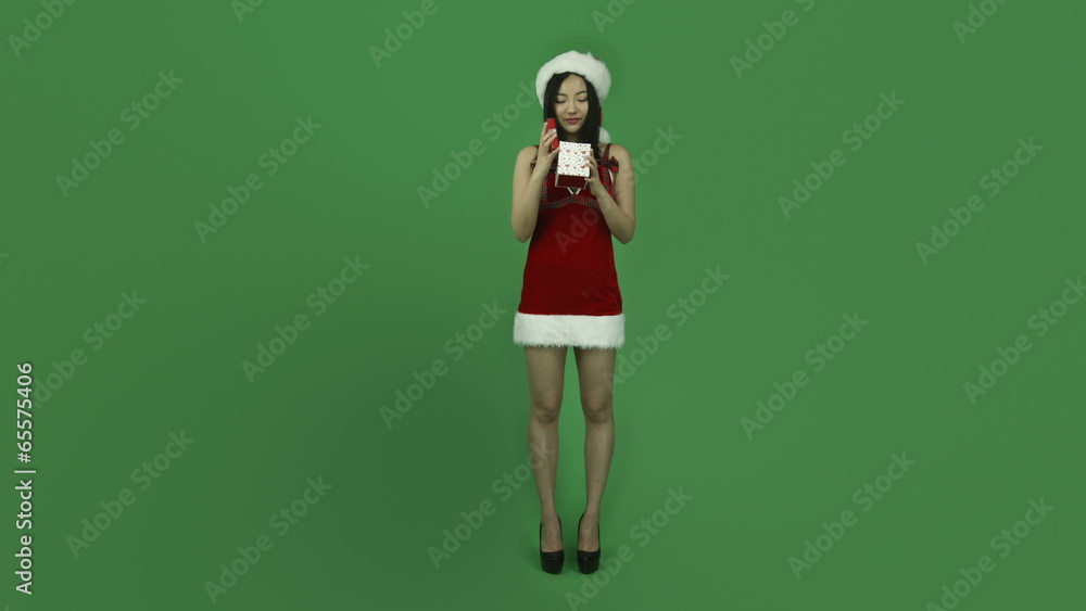 Asian girl sexy santa claus isolated greenscreen green Asian girl sexy santa claus isolated greenscreen green