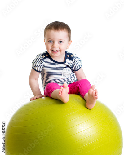 kid girl doing fitness exer...